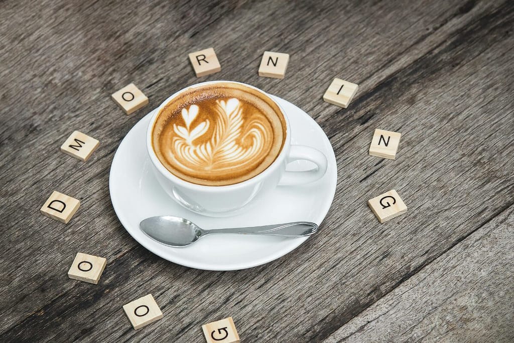 coffee in a cup with a cream design on top