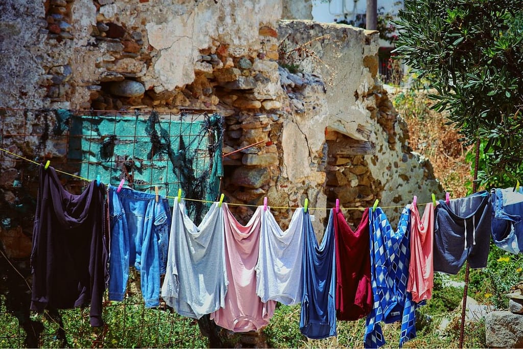 Laundry on line outside a crumbling old structure